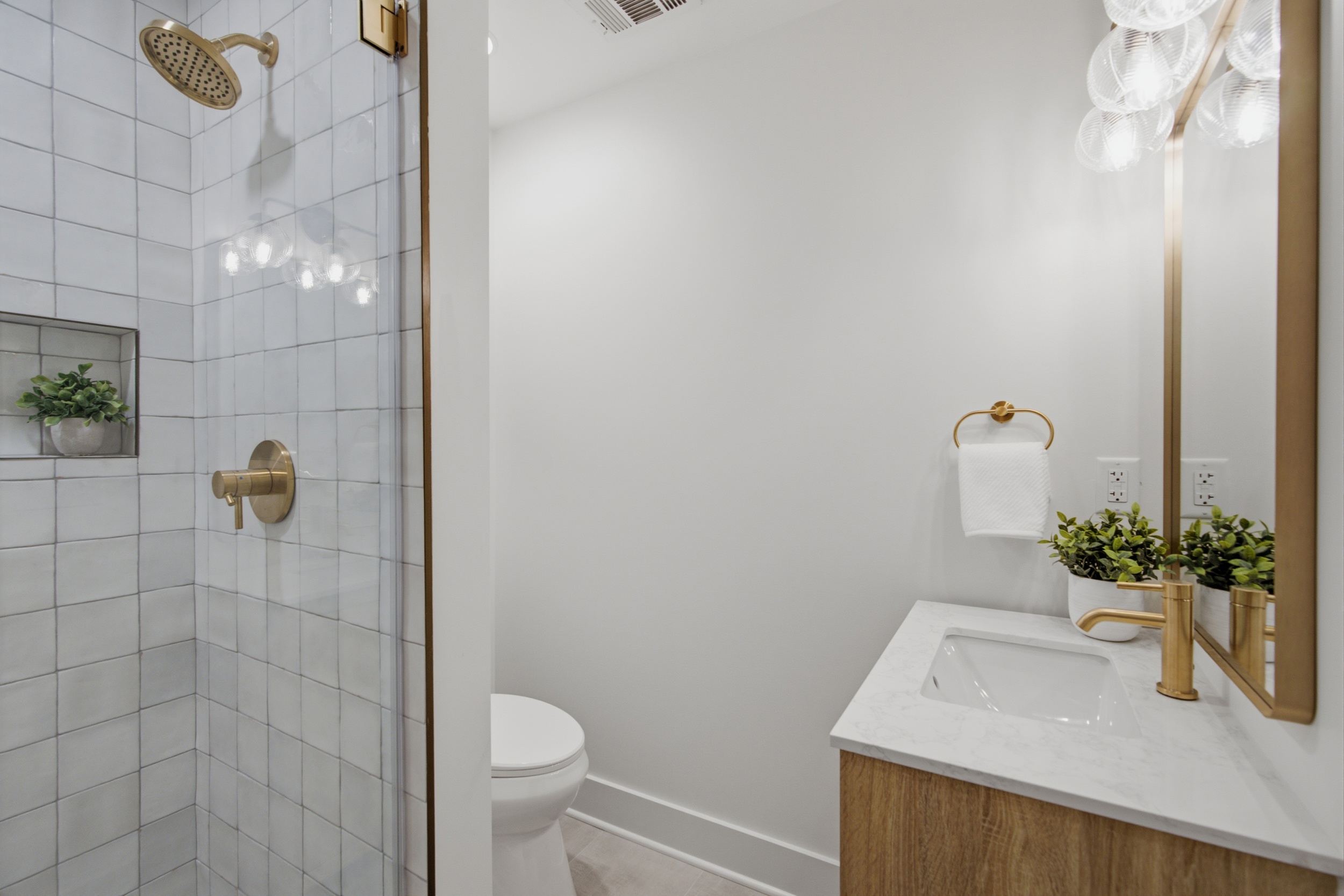 Huntington bathroom with brass fixtures